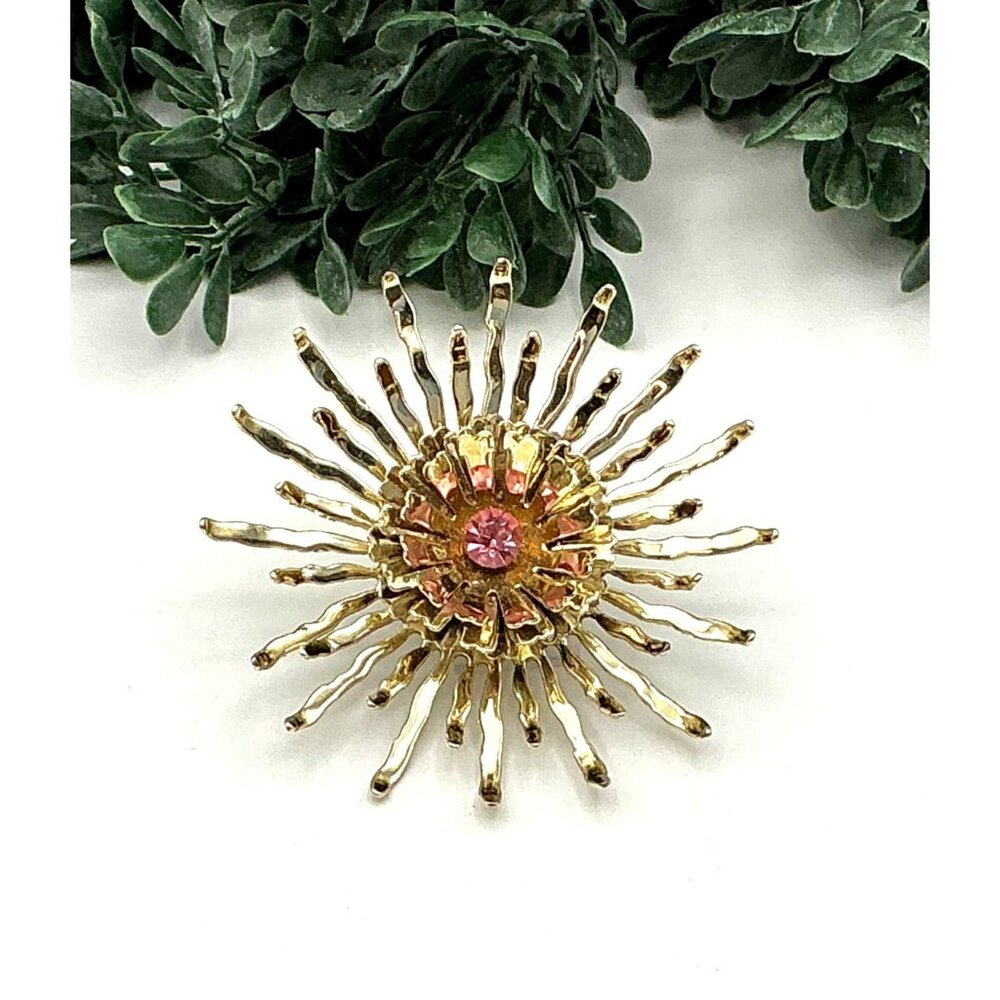 Vintage Gold-Tone Starburst Brooch With Pink Rhinestone Center